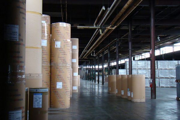 Containers in a public warehouse space