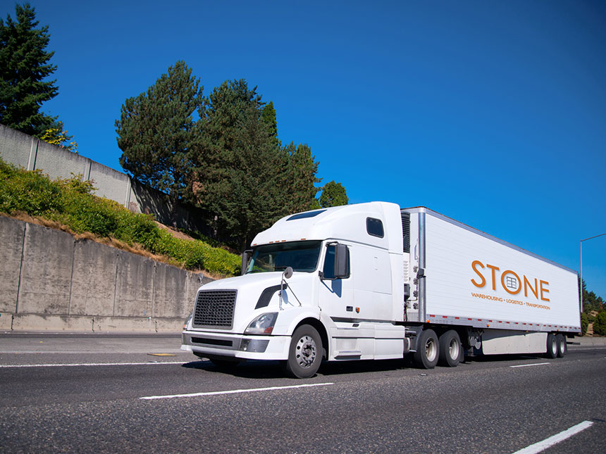 Stone Management transportation truck on road