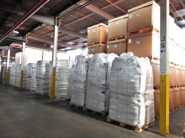 Boxes and pallets stacked in Stone Management's 3PL warehouse.